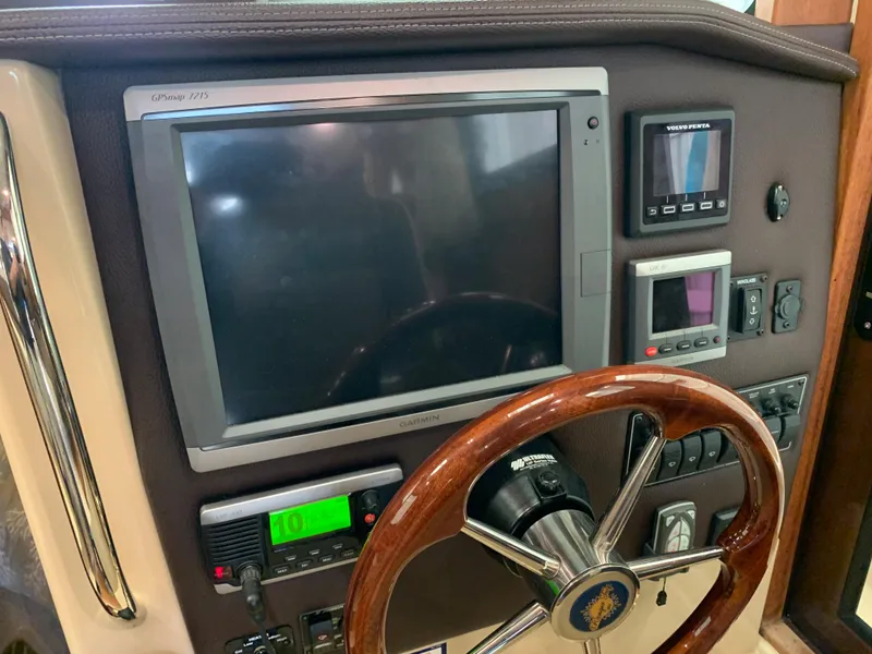 Slide: The Image of 2014 Ranger Tugs Trawler helm with navigation and control systems. - 11