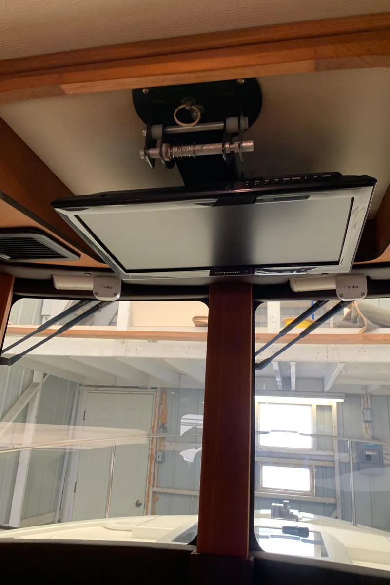 Slide: The Image of 2014 Ranger Tugs Trawler interior with mounted TV screen. - 20