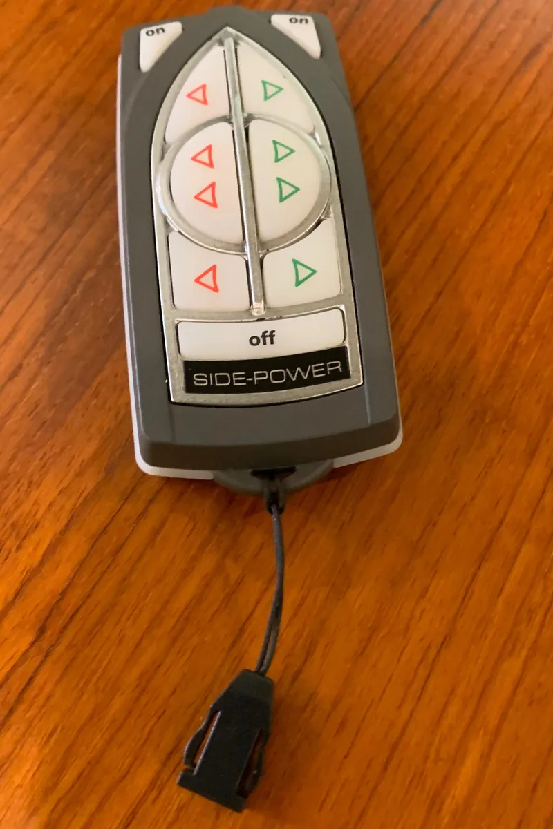 Slide: The Image of Remote control for 2014 Ranger Tugs Trawler boat on wooden surface. - 19