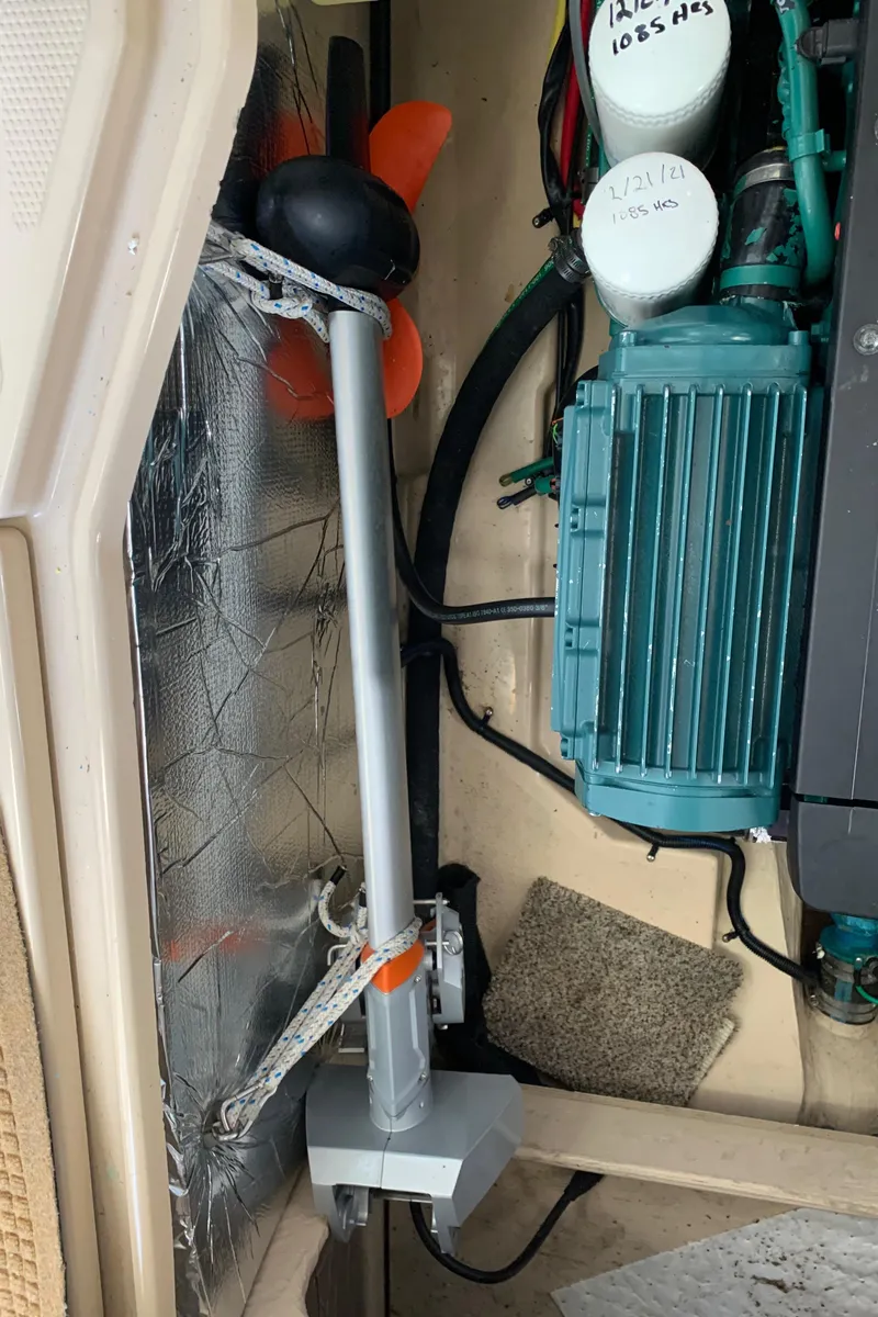 Slide: The Image of Engine compartment of a 2014 Ranger Tugs Trawler with visible components. - 21