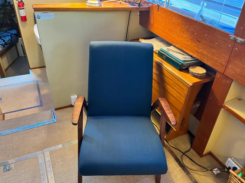 Slide: The Image of Blue armchair inside 1962 Chris-Craft Constellation boat cabin. - 6