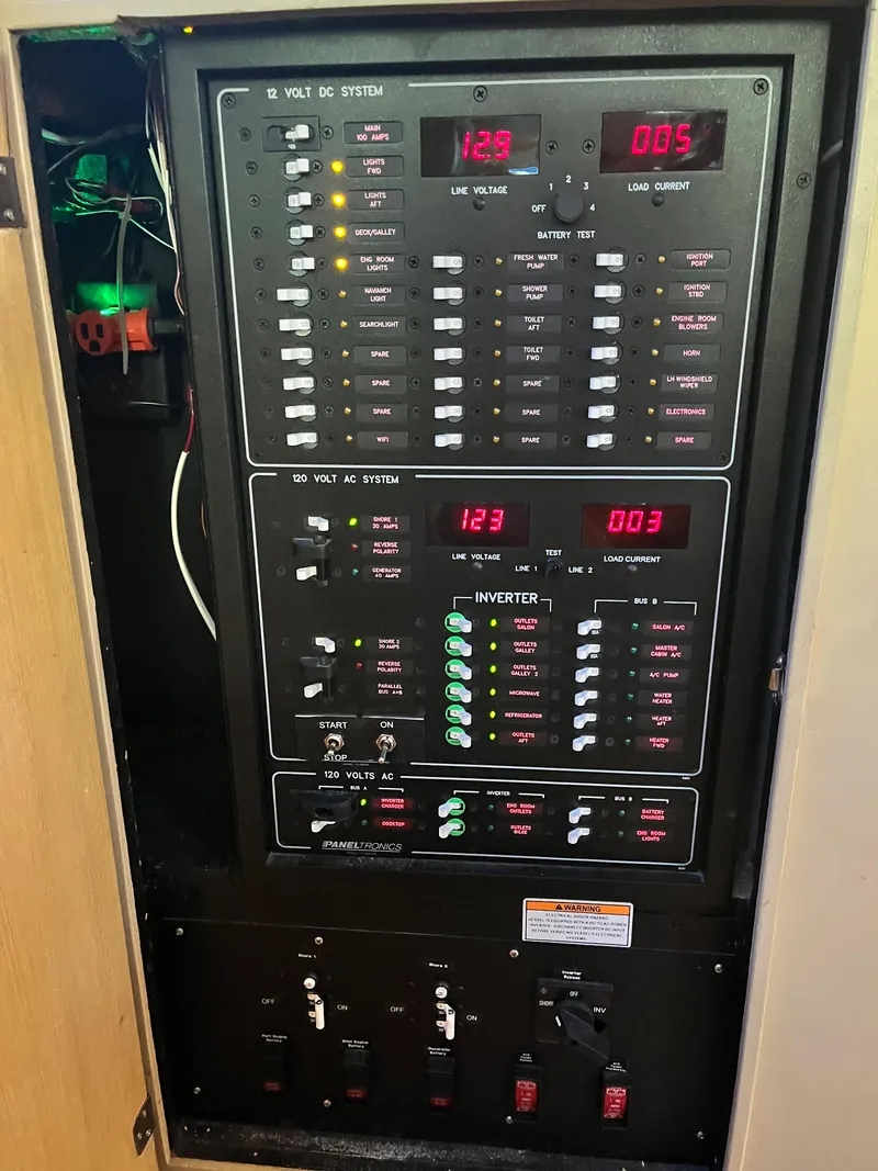 Slide: The Image of Electrical panel of a 1962 Chris-Craft Constellation boat, showing voltage and system controls. - 7