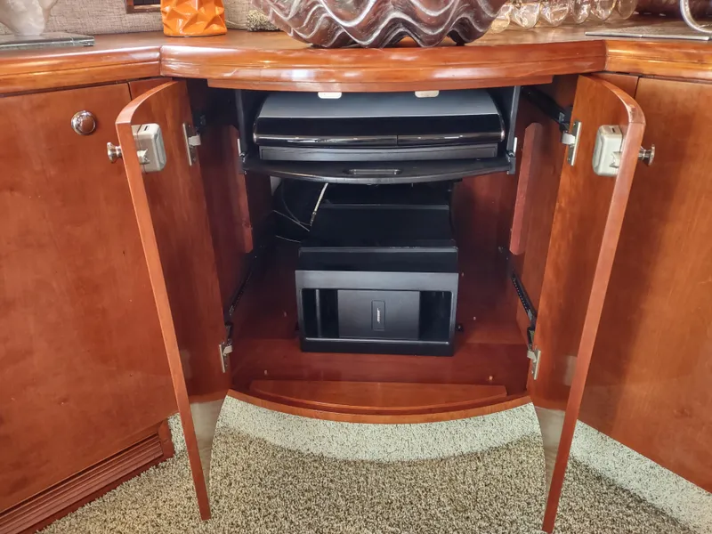 Slide: The Image of Open cabinet on Fairline 66 yacht (1997) with electronic equipment inside. - 11