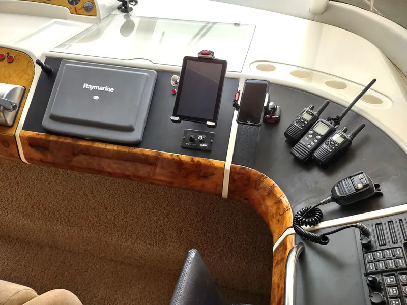 Slide: The Image of Control panel of a 1997 Fairline 66 yacht with navigation and communication devices. - 22
