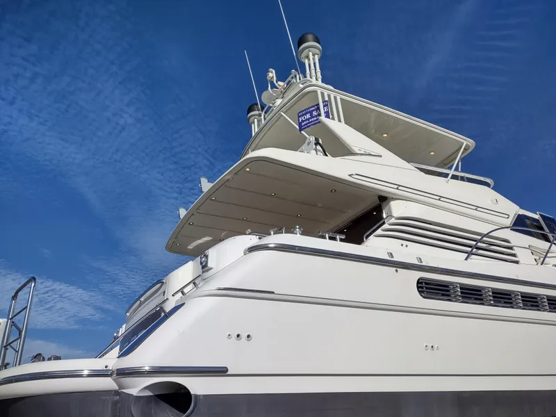 Slide: The Image of 1997 Fairline 66 yacht against a clear blue sky. - 3
