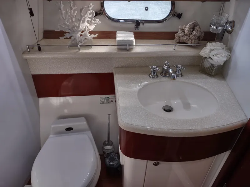 Slide: The Image of Luxurious bathroom in a 1997 Fairline 66 yacht with modern fixtures. - 44