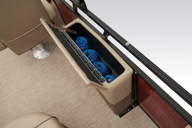 Slide: The Image of 2024 Regency 250 DL3 storage compartment with blue towels. - 37