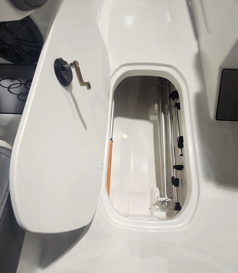 Slide: The Image of 2024 Tahoe T21 boat storage compartment with open hatch. - 11