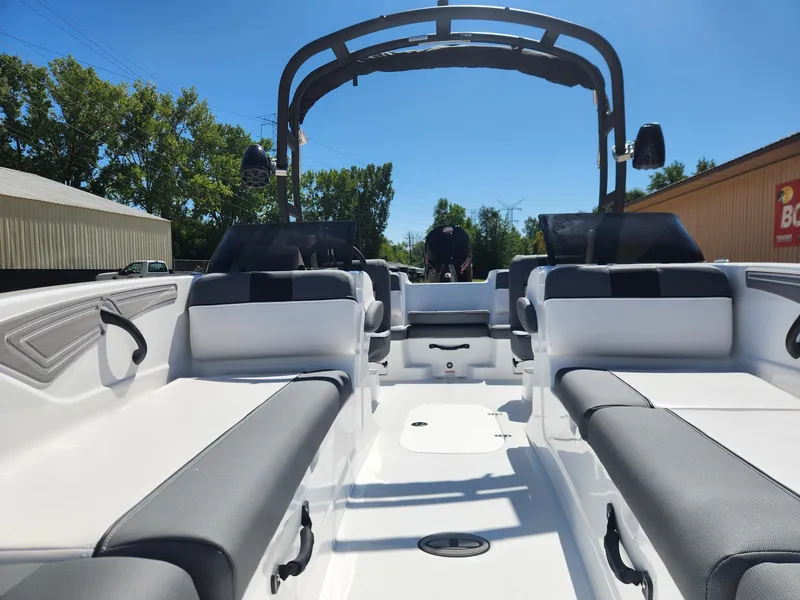 Slide: The Image of 2024 Tahoe T21 boat interior with seating and canopy. - 26