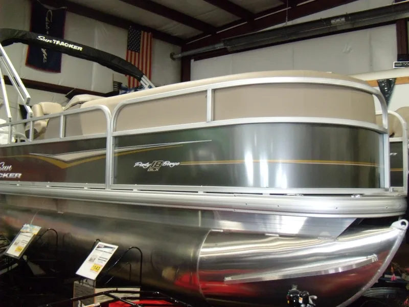 The Image of 2024 Sun Tracker Party Barge 18 DLX pontoon boat in showroom. - 0