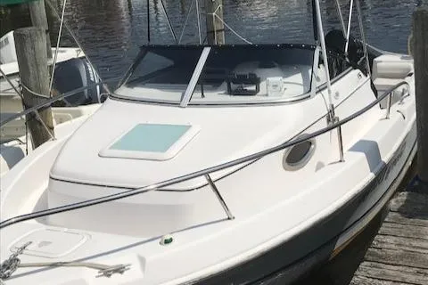 Slide: The Image of 2007 Pro-Line 21 WALK-AROUND boat docked at marina. - 4