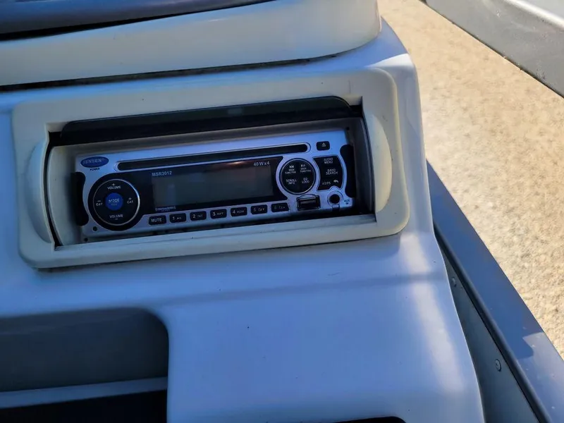 Slide: The Image of Boat stereo system on a 2008 Custom Neptune 23. - 2