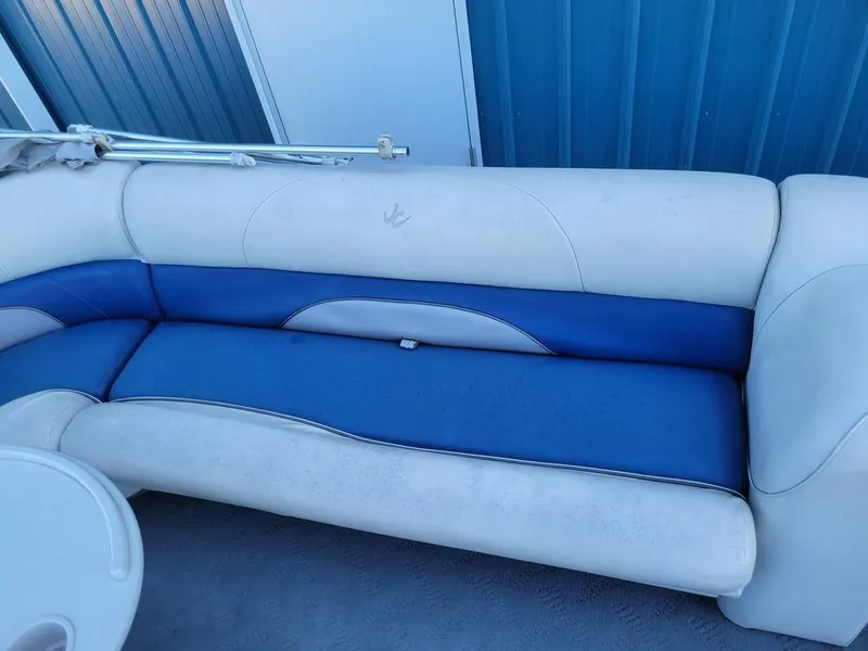 Slide: The Image of Custom Neptune 23 2008 boat seating with blue and white upholstery. - 5