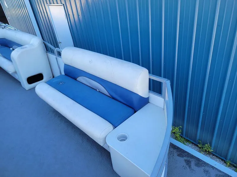 Slide: The Image of 2008 Custom Neptune 23 boat with blue and white seating - 7