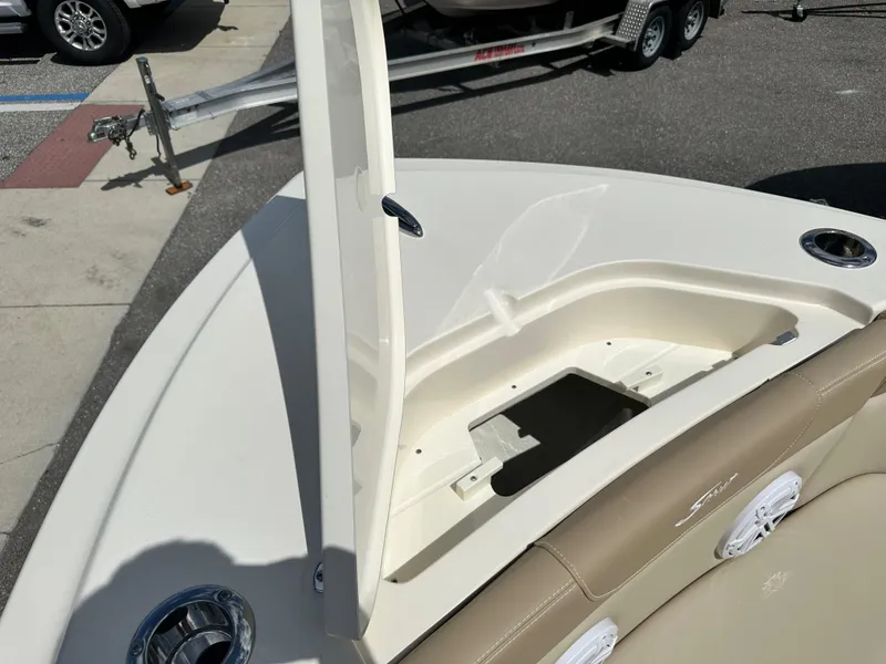 Slide: The Image of 2024 Scout 215 Dorado boat storage compartment with open hatch. - 15