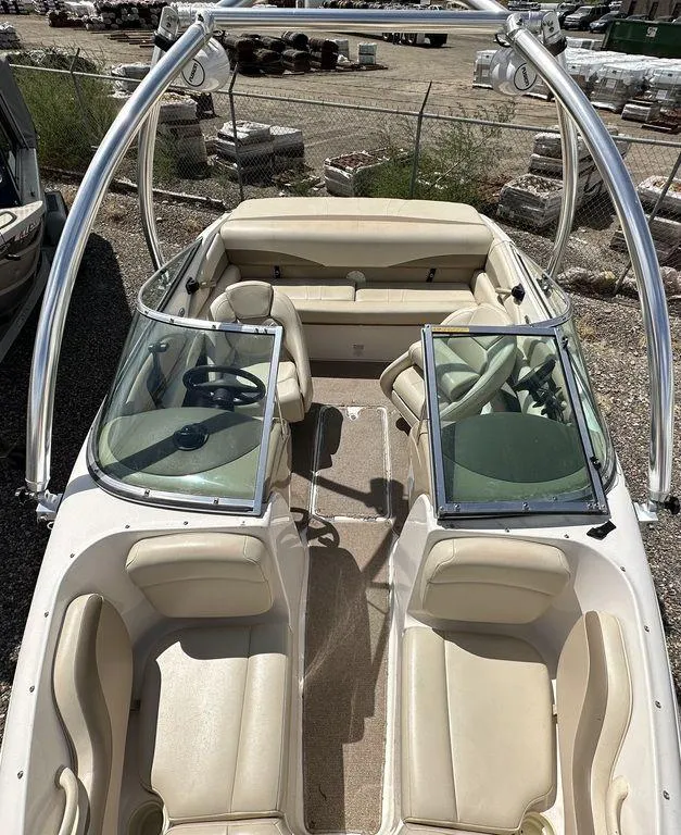 Slide: The Image of 2004 Chaparral 190SSI boat with beige interior and open bow seating. - 11
