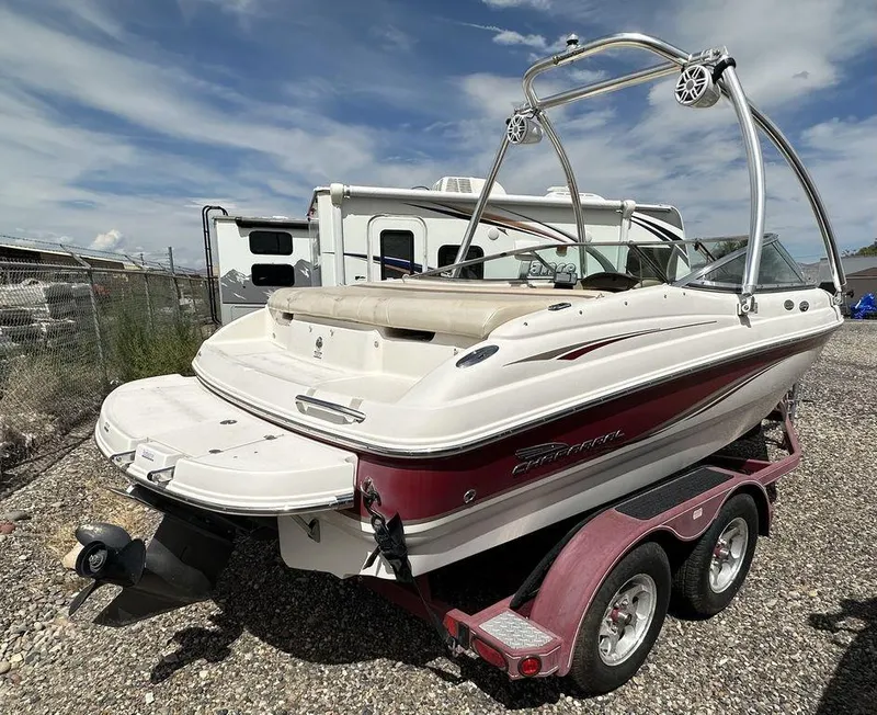 Slide: The Image of 2004 Chaparral 190SSI boat on trailer, rear view, white and red color. - 2