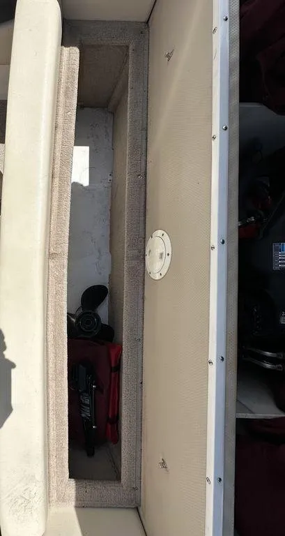 Slide: The Image of Storage compartment of a 2004 Chaparral 190SSI boat. - 6