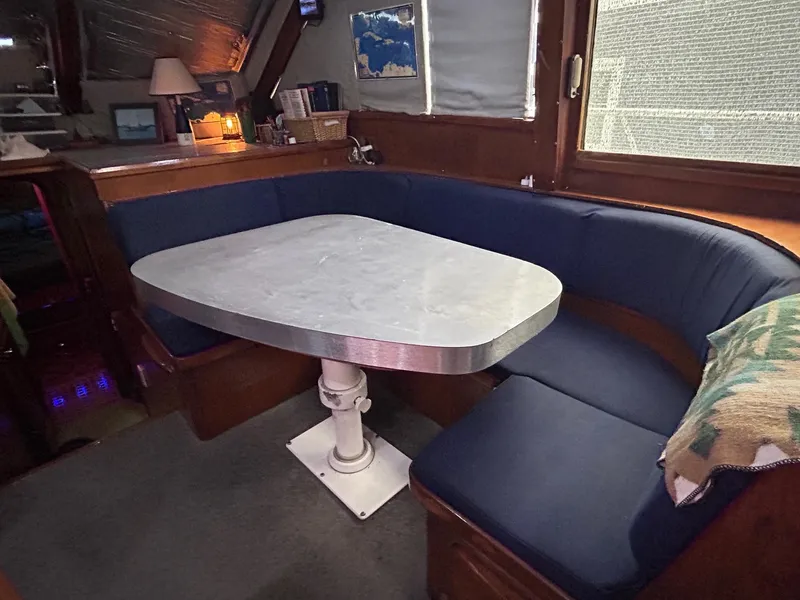 Slide: The Image of Dinette with covered table - 33