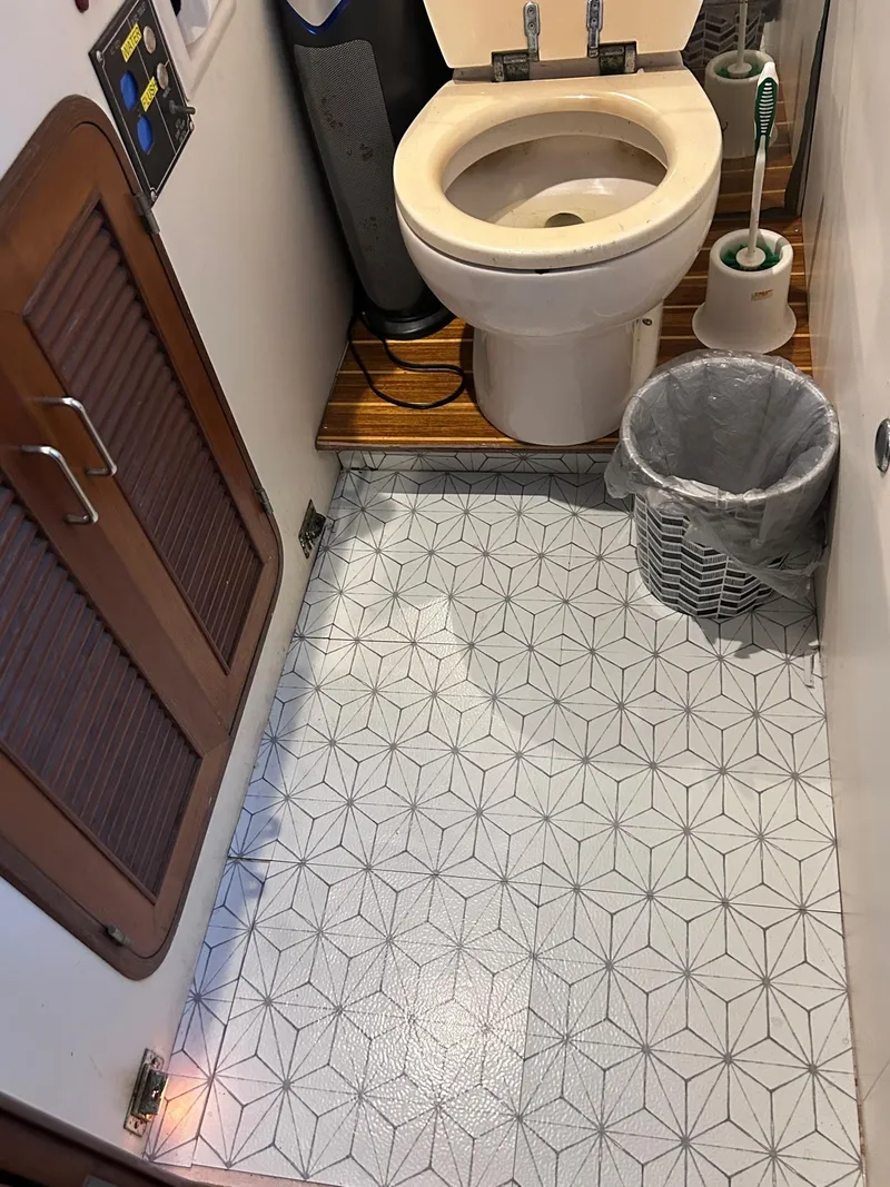 Slide: The Image of Aft head custom tied floor - 60