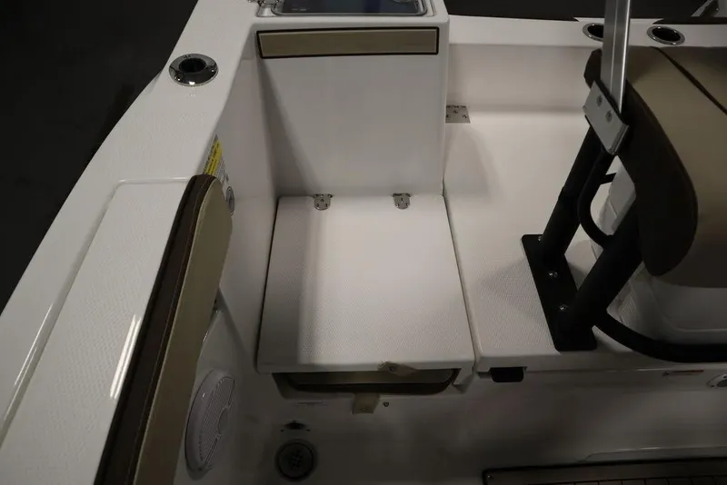 Slide: The Image of 2024 Yamaha Boats 222 FSH Sport interior seating and deck area. - 20