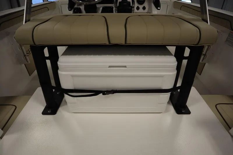 Slide: The Image of 2024 Yamaha Boats 222 FSH Sport seating with integrated cooler storage. - 21
