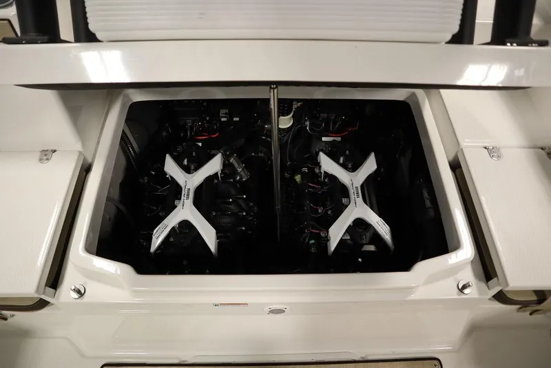 Slide: The Image of 2024 Yamaha Boats 222 FSH Sport engine compartment with dual engines visible. - 39