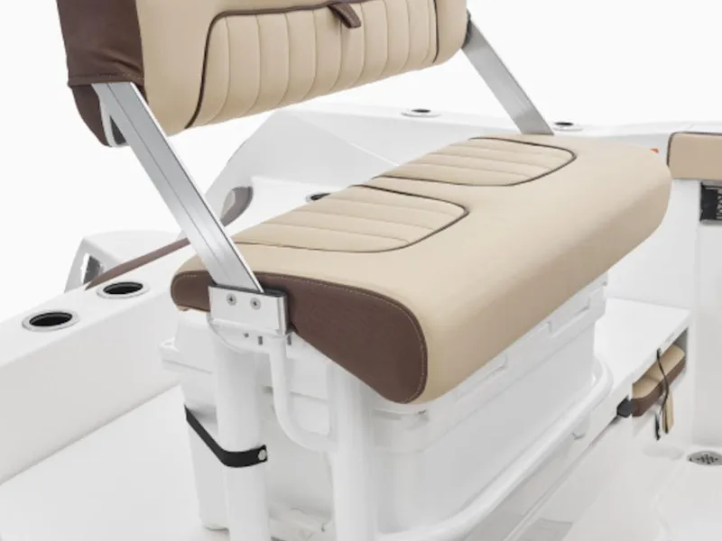 Slide: The Image of 2024 Yamaha Boats 222 FSH Sport seating with beige and brown upholstery. - 6