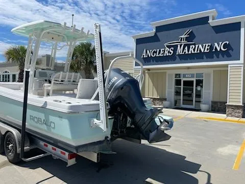 Slide: The Image of 2016 Robalo 246 Cayman boat at Anglers Marine NC dealership. - 2