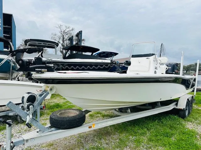 Slide: The Image of 2012 Sea Fox 22 XT boat on trailer, parked outdoors. - 4