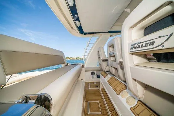 Slide: The Image of Interior of 2017 Boston Whaler 42 OUTRAGE boat with seating and deck view. - 18