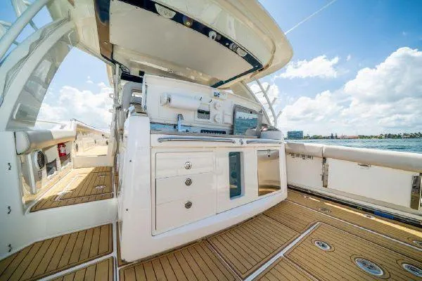 Slide: The Image of 2017 Boston Whaler 42 OUTRAGE boat interior with modern amenities and ocean view. - 22
