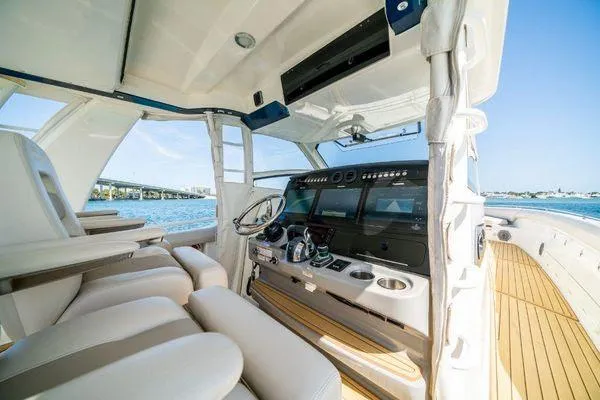 Slide: The Image of 2017 Boston Whaler 42 OUTRAGE helm with modern controls and luxurious seating. - 34