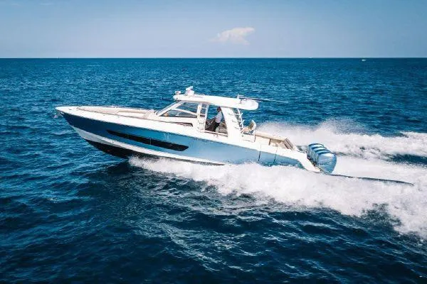Slide: The Image of 2017 Boston Whaler 42 OUTRAGE cruising on open blue ocean. - 4