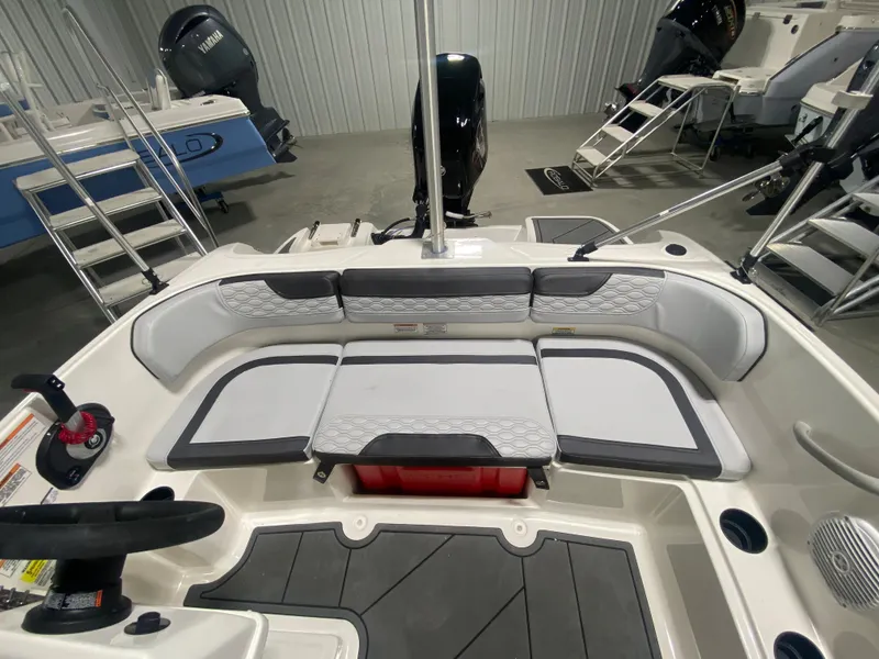 Slide: The Image of 2024 Bayliner Element M15 boat interior with seating and storage compartments. - 8
