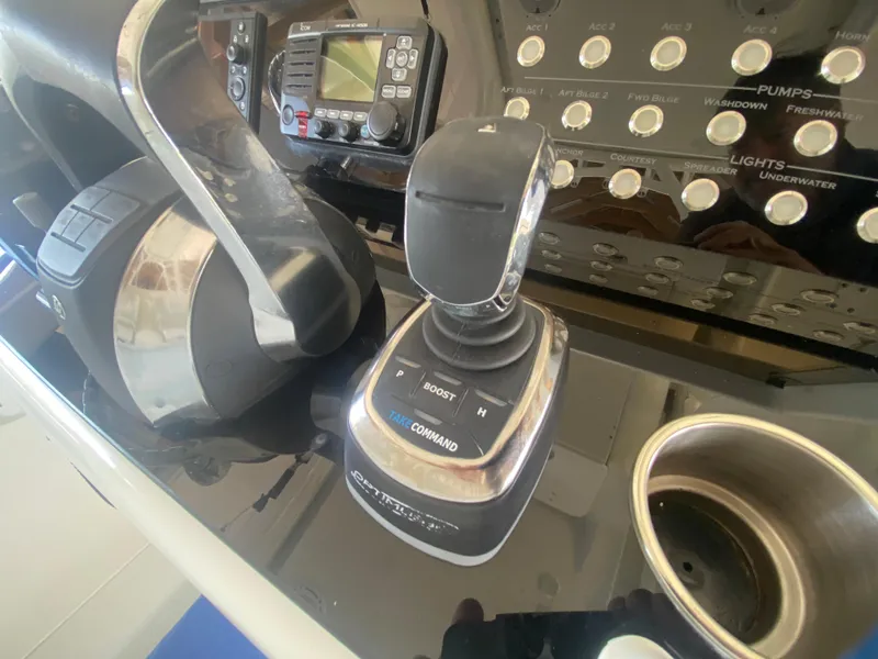 Slide: The Image of 2013 Yellowfin 39 boat control panel with joystick and throttle. - 11