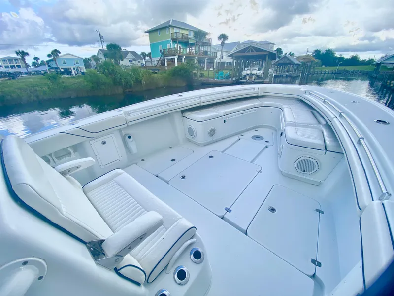 Slide: The Image of 2013 Yellowfin 39 boat with spacious seating and storage compartments. - 23