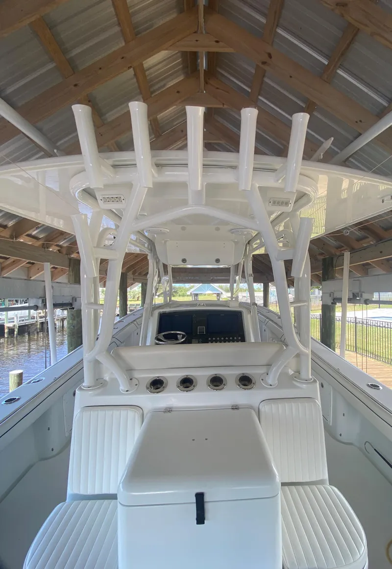 Slide: The Image of 2013 Yellowfin 39 boat under covered dock. - 32
