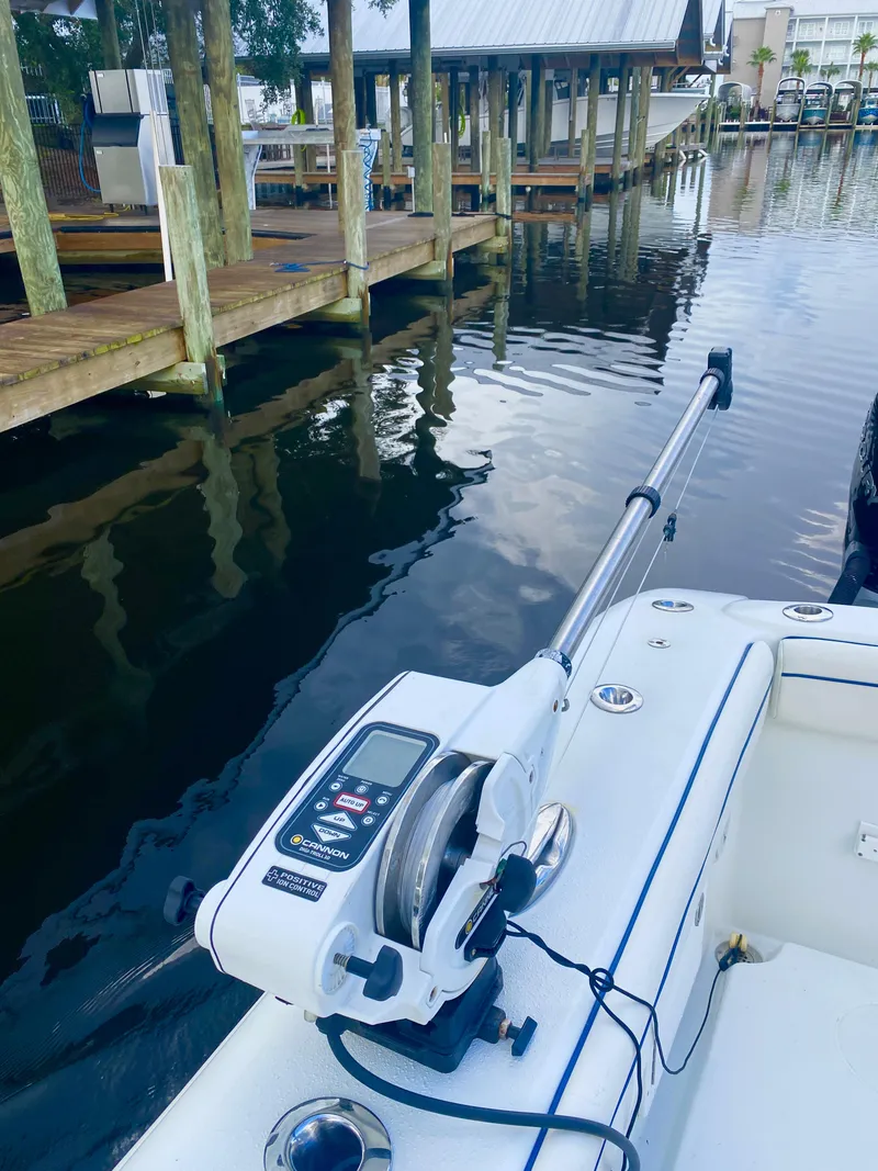 Slide: The Image of 2013 Yellowfin 39 boat docked near wooden piers. - 38
