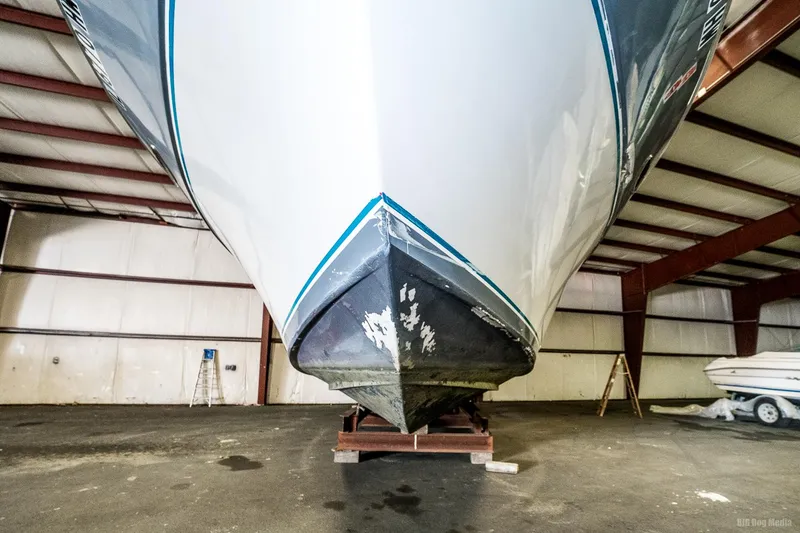 Slide: The Image of 1987 Chris-Craft 320 Amerosport Express boat in storage facility. - 7