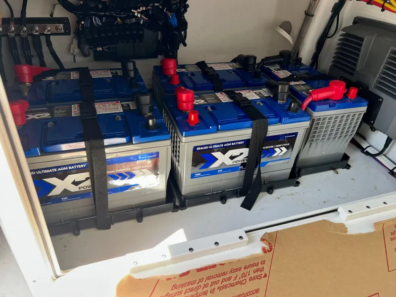 Slide: The Image of Four secured X Power batteries in a Freeman 37VH, 2021 model. - 10