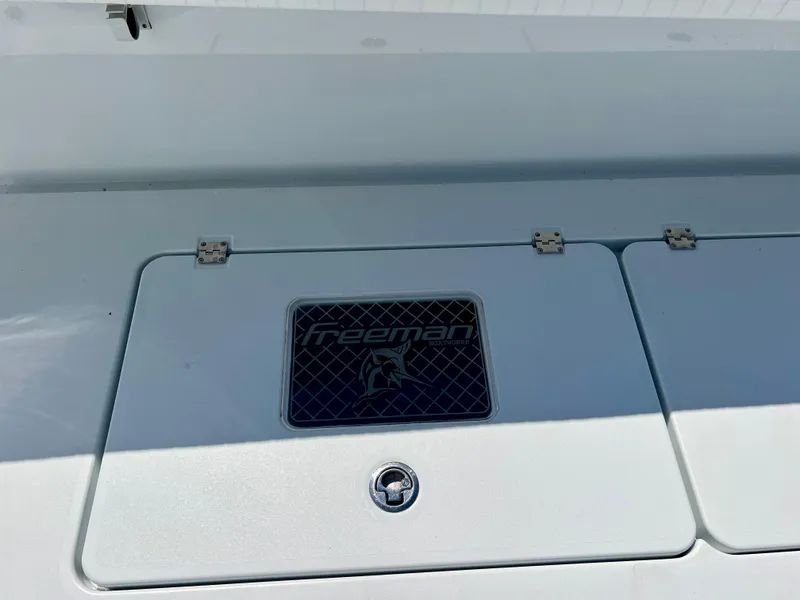 Slide: The Image of Freeman 37VH 2021 boat hatch with logo and secure latch. - 14
