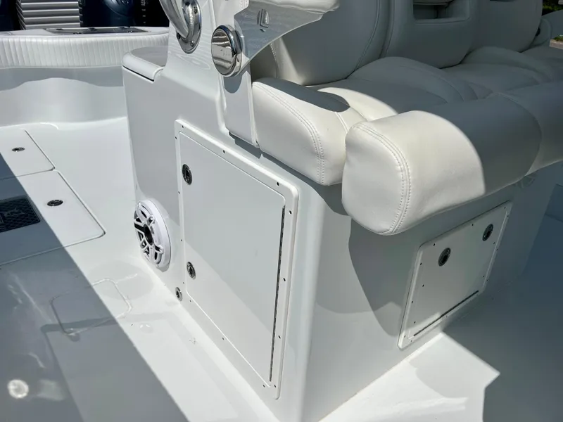 Slide: The Image of 2021 Freeman 37VH boat interior with white seating and storage compartments. - 19