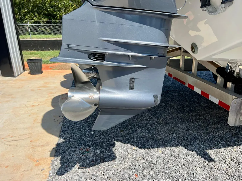 Slide: The Image of Outboard motor of a 2021 Freeman 37VH boat on a trailer. - 7
