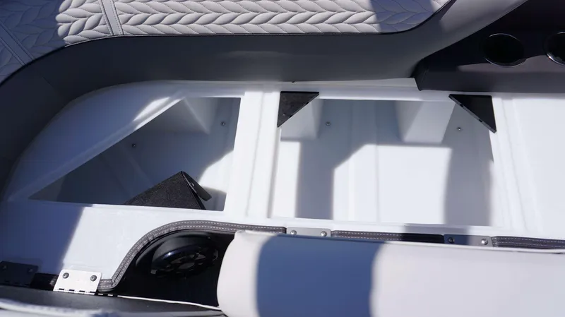 Slide: The Image of 2024 MONACO 235 DFL boat interior storage compartment with quilted upholstery. - 9