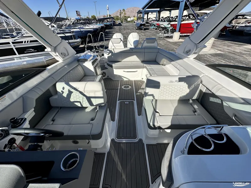Slide: The Image of 2024 Sea Ray SDX 290 OB boat interior with luxurious seating and modern design. - 5