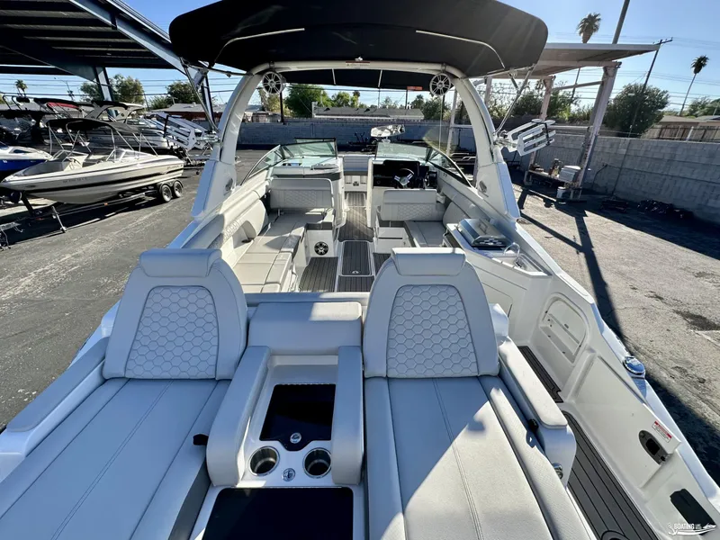 Slide: The Image of 2024 Sea Ray SDX 290 OB boat interior with luxurious seating and modern design. - 6