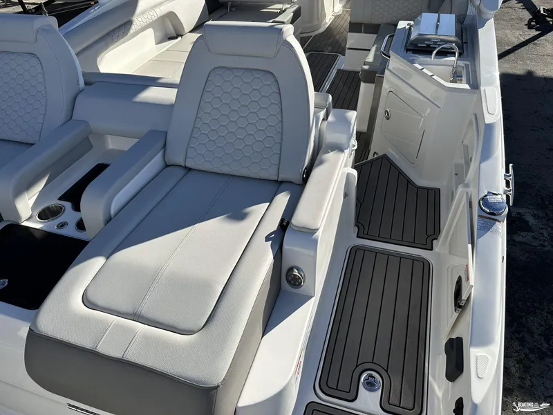 Slide: The Image of 2024 Sea Ray SDX 290 OB boat interior with luxurious seating and sleek design. - 7