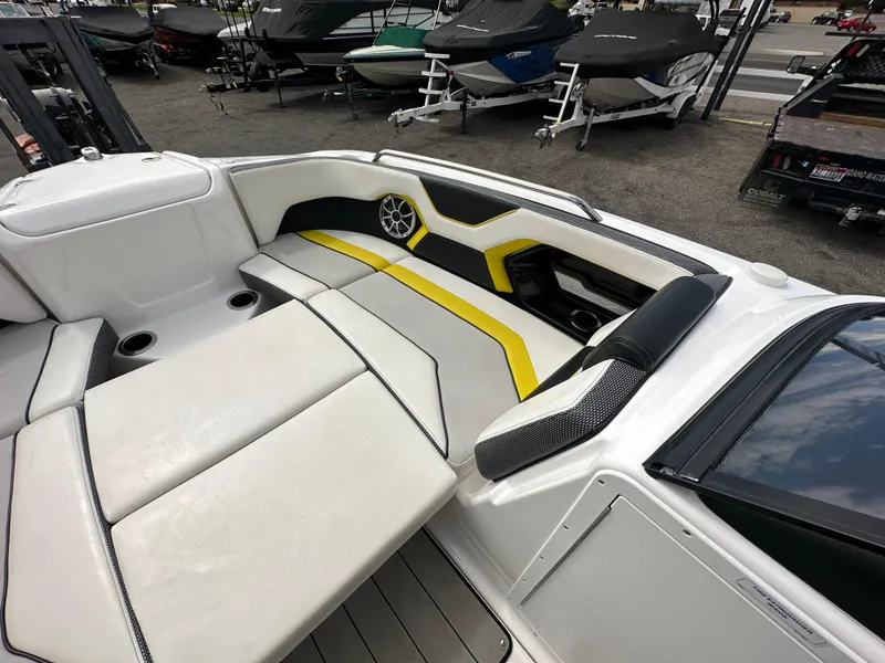 Slide: The Image of 2020 Yamaha 212X jet boat interior with sleek seating and modern design. - 14