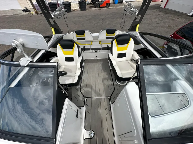 Slide: The Image of 2020 Yamaha 212X jet boat interior with modern seating and sleek design. - 16